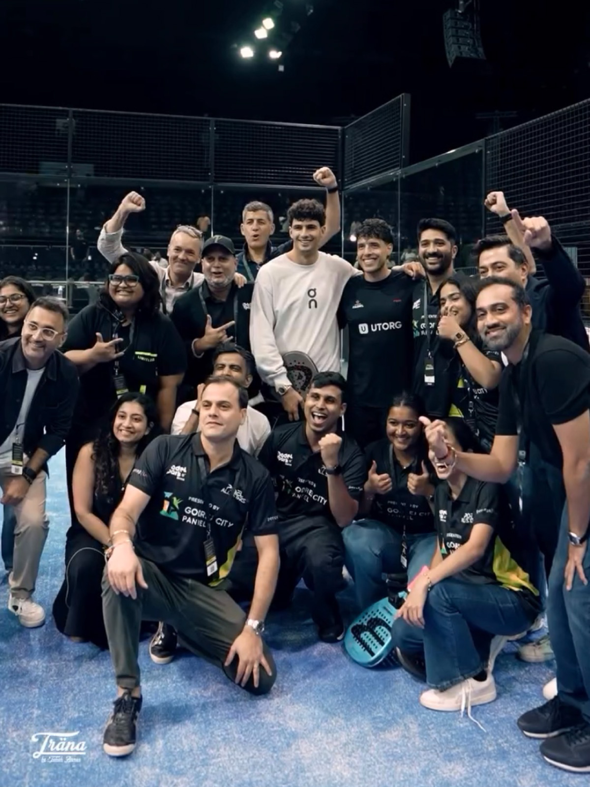 Group photo of the Padel Park India and Victor Perez Padel teams celebrating with Arturo Coello and Agustín Tapia on court at the Padel All Stars exhibition in Mumbai